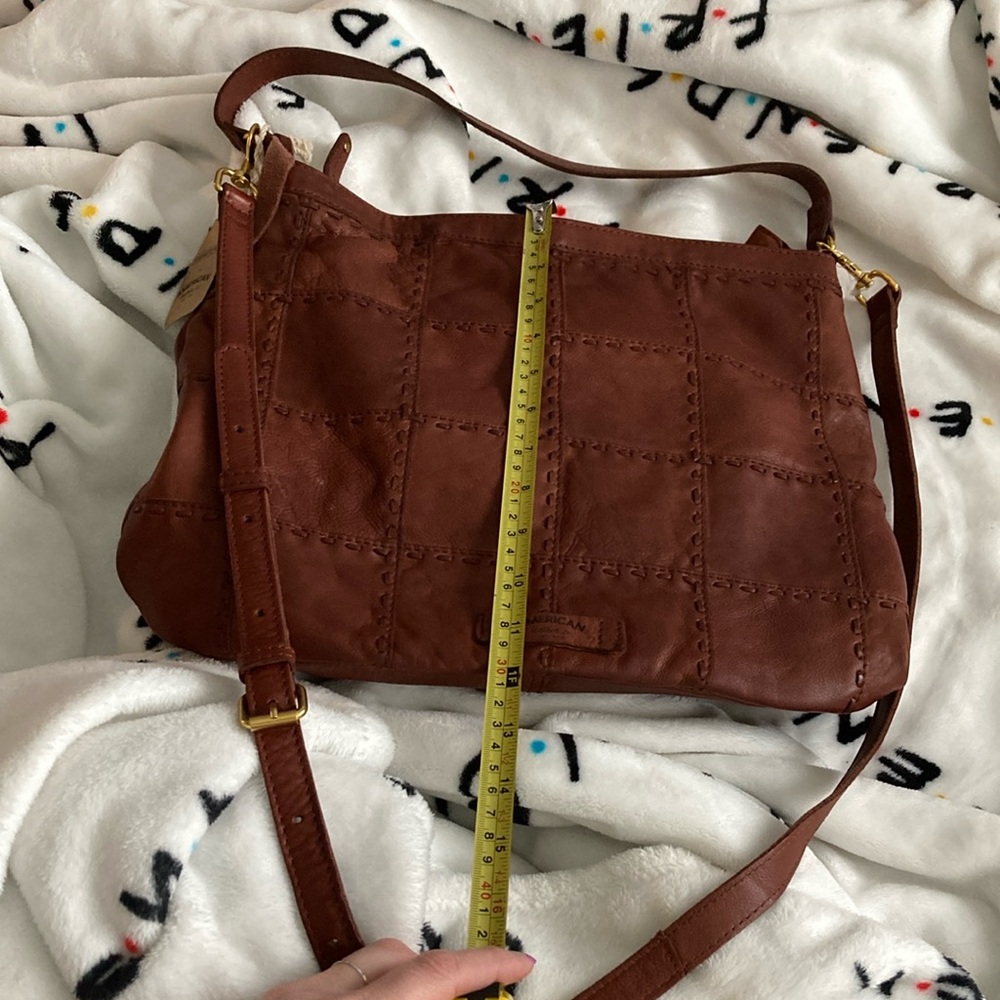 American Leather Co Carroll Conv Ziptop Bucket Hobo 2.0 in color Brandy